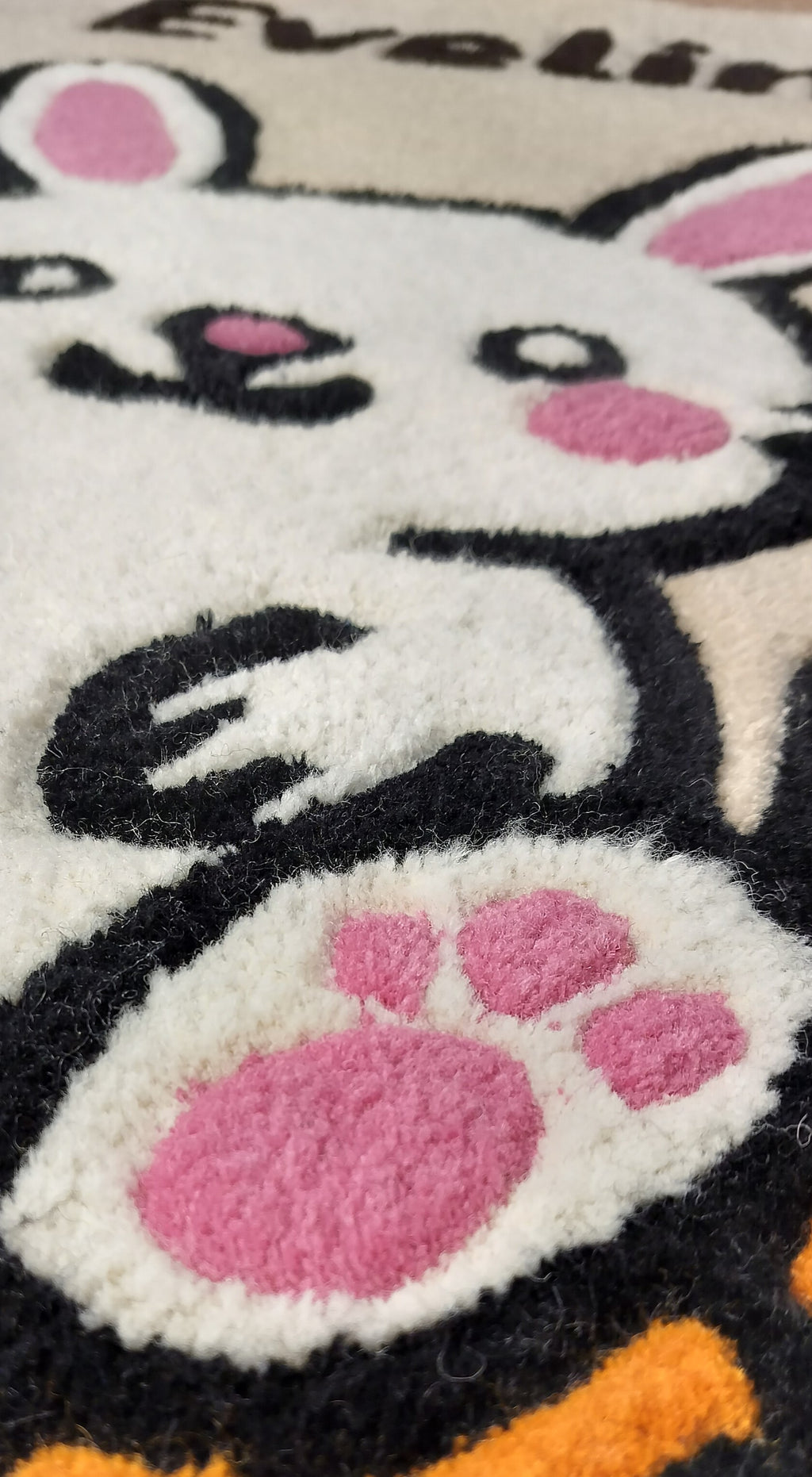 Close-up of handmade personalised wool rug with natural texture and hand-finished details