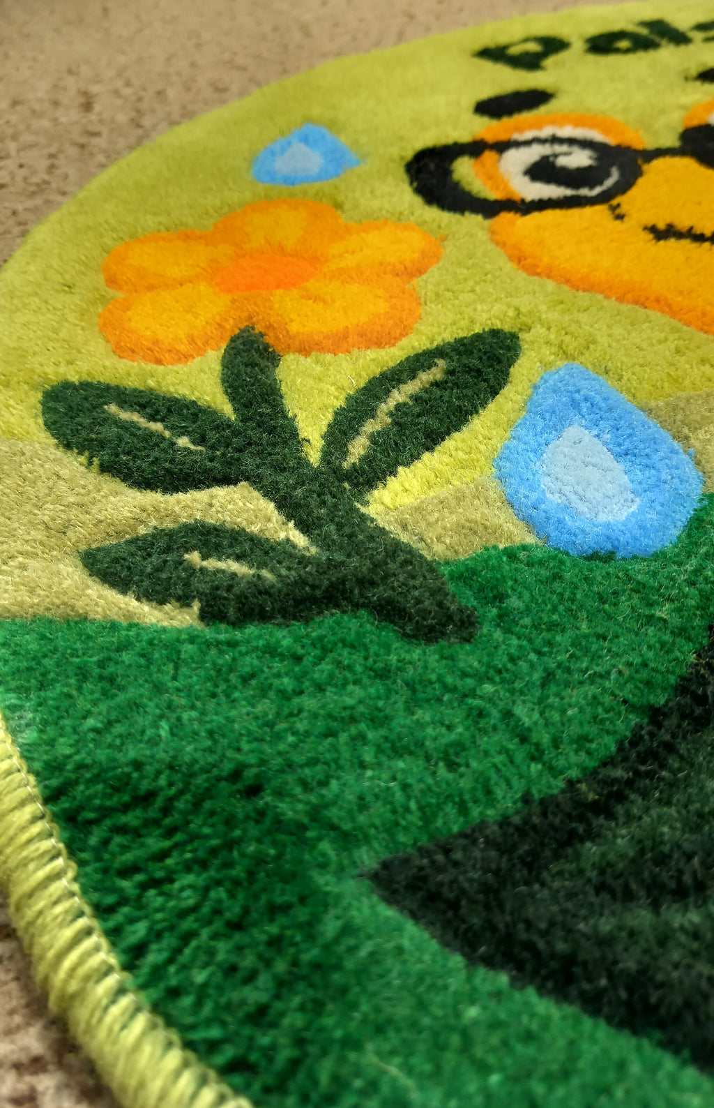Close-up of handmade personalised wool rug with natural texture and hand-finished details