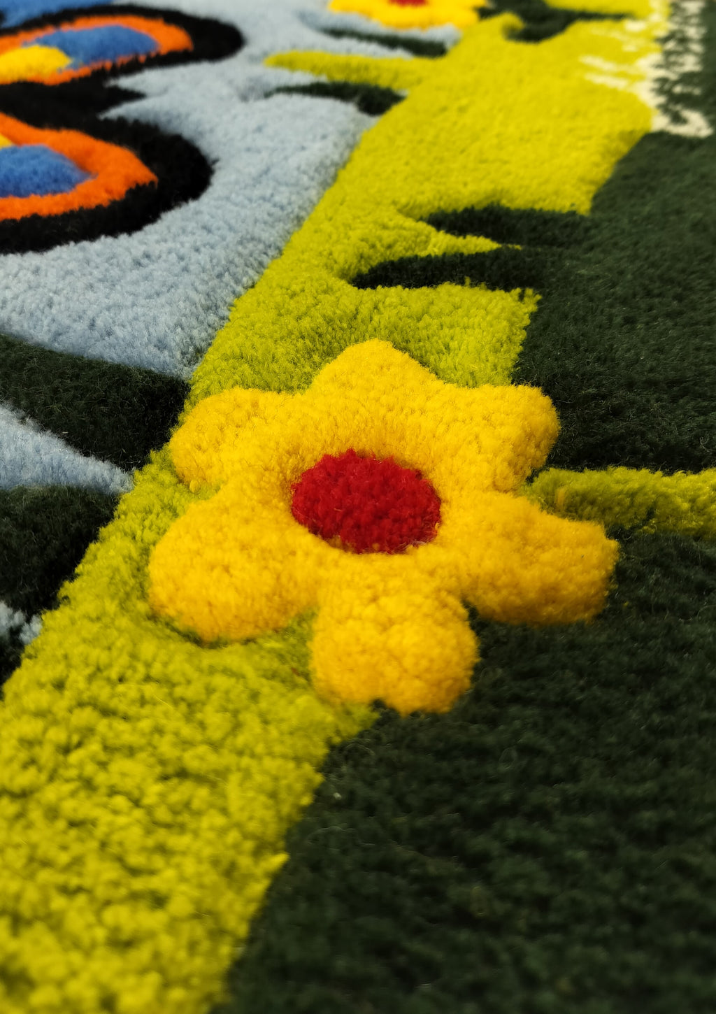 Close-up of handmade personalised wool rug with natural texture and hand-finished details
