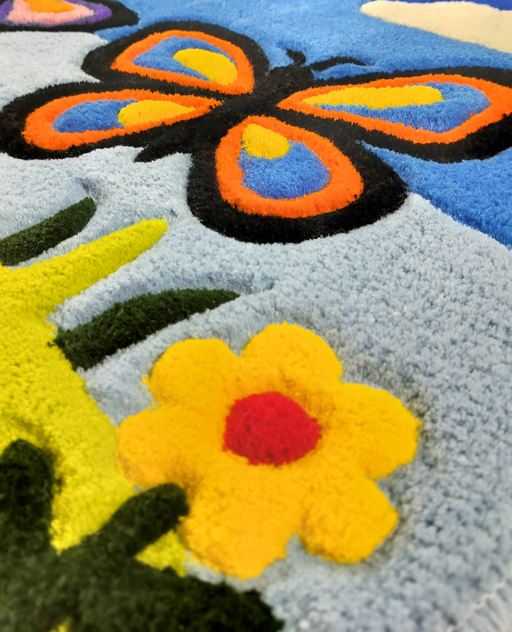 Close-up of handmade personalised wool rug with natural texture and hand-finished details