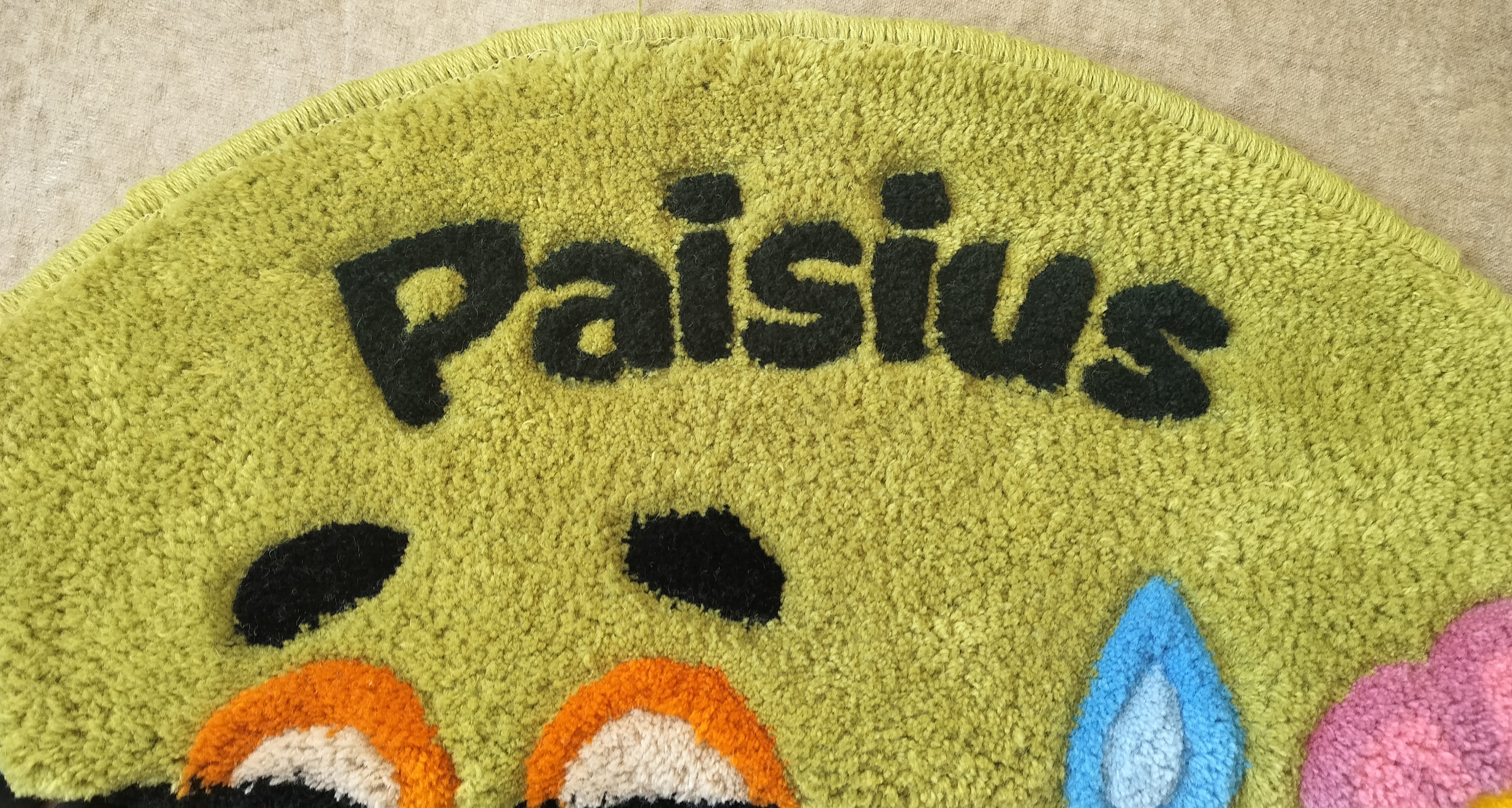 Close-up of handmade personalised wool rug with natural texture and hand-finished details