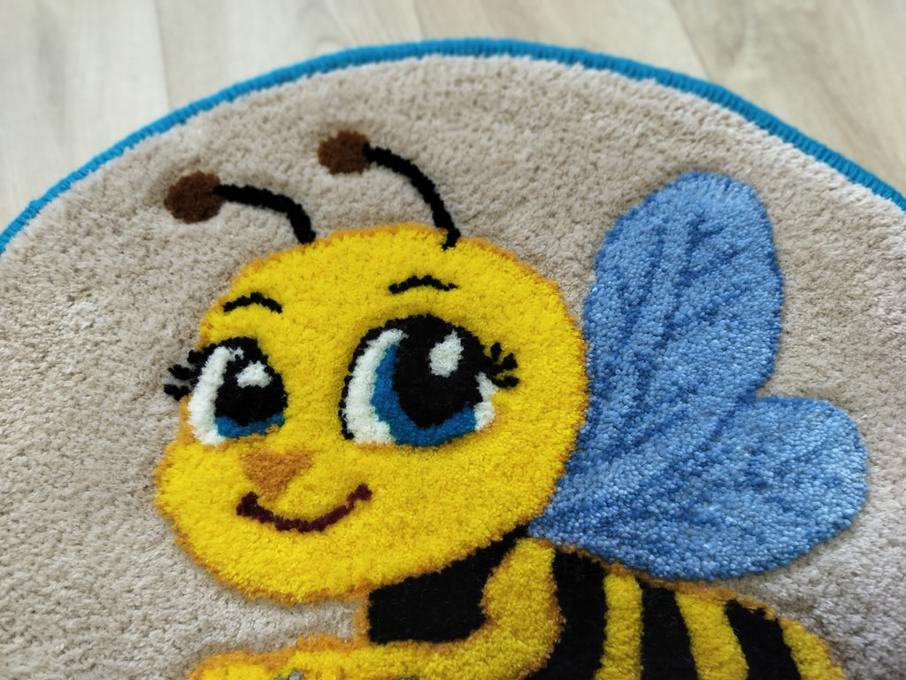 close up of bee wool rug texture handmade tufted natural wool detailed carving