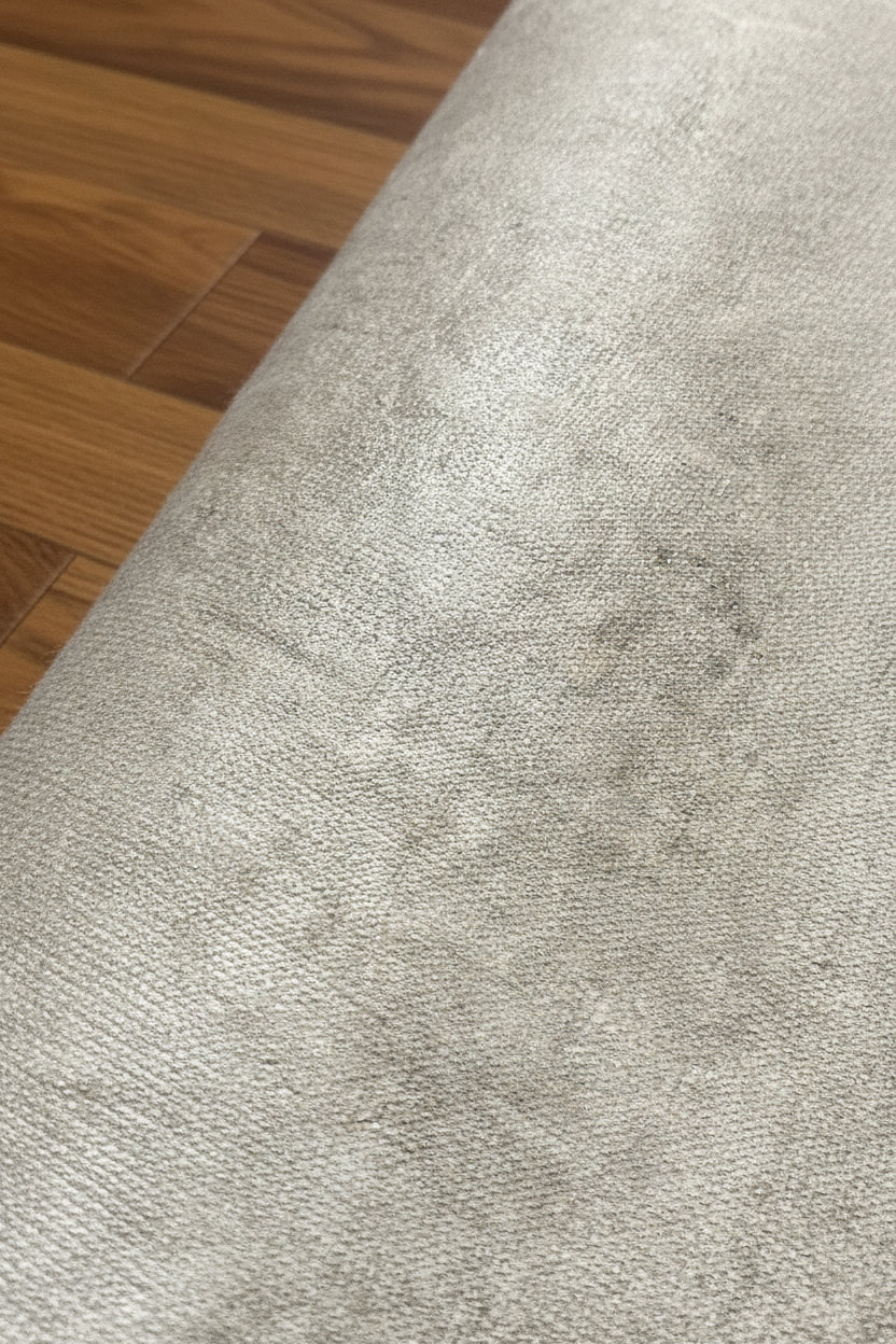 Natural linen backing used on handmade personalised wool rugs for durability and grip