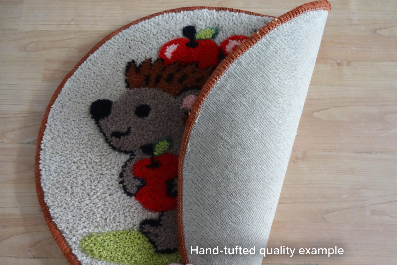 Handmade personalised hedgehog wool rug made from 100% natural wool with non-slip latex backing