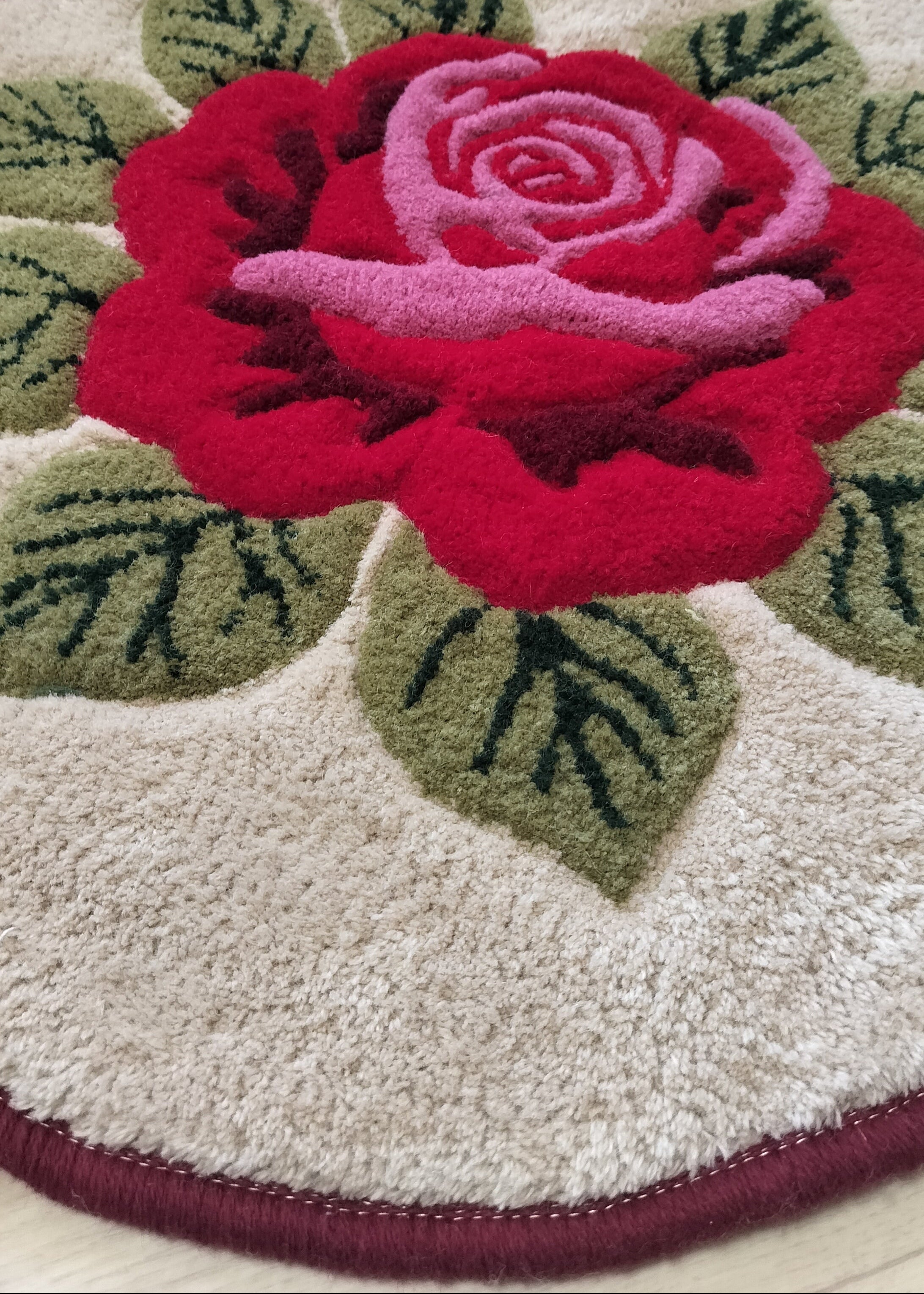 Hand tufted wool rug with rose design personalized with name or initials