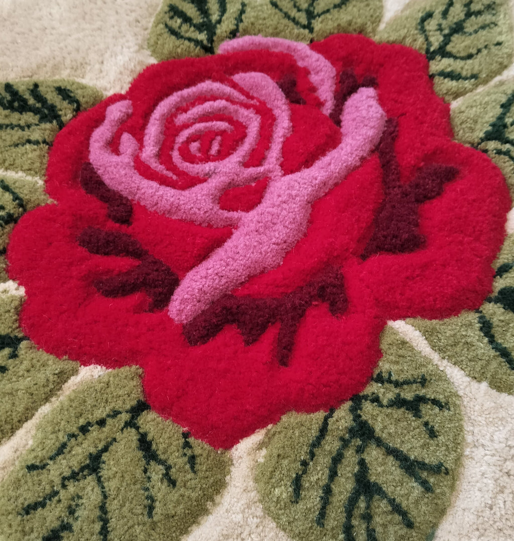 Hand tufted wool rug with rose design personalized with name or initials